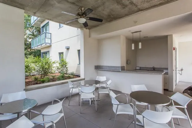 a room with a table and chairs