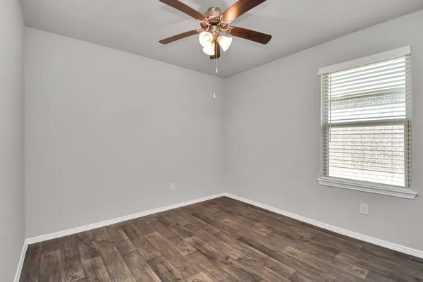 a black and white photo of a living room