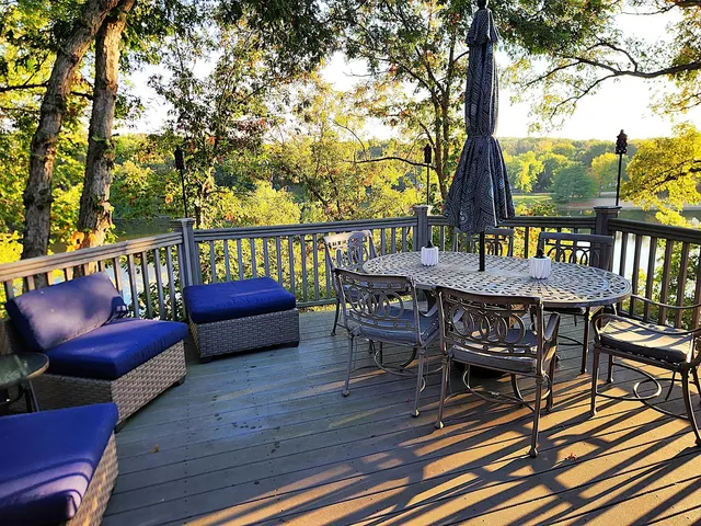 a view of a chairs and table on the wooden floor