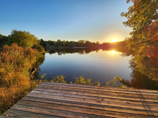 a view of a lake from a balcony