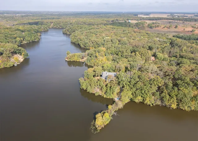 a view of ocean with a mountain