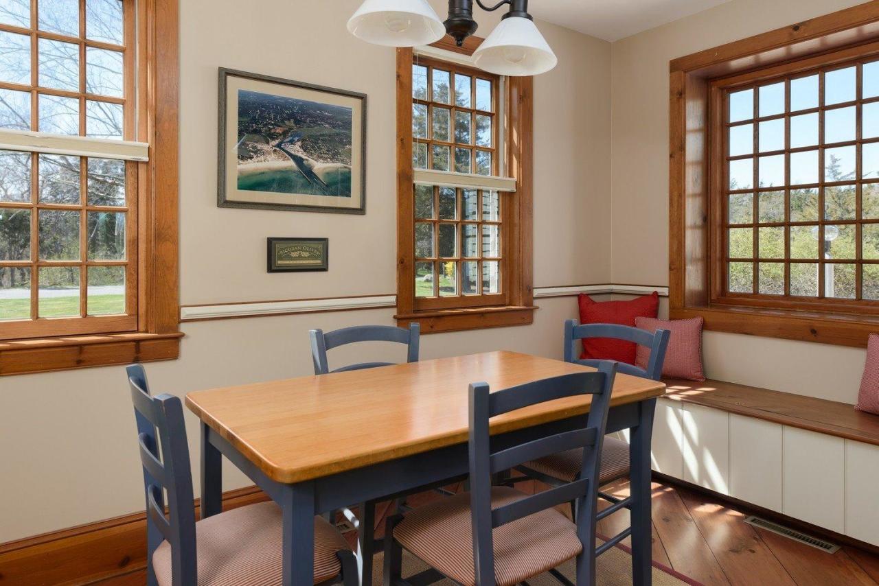 52 Point Hill Road West Barnstable, MA 02668 - Photo 11 of 28 a view of a dining room with furniture window and wooden floor