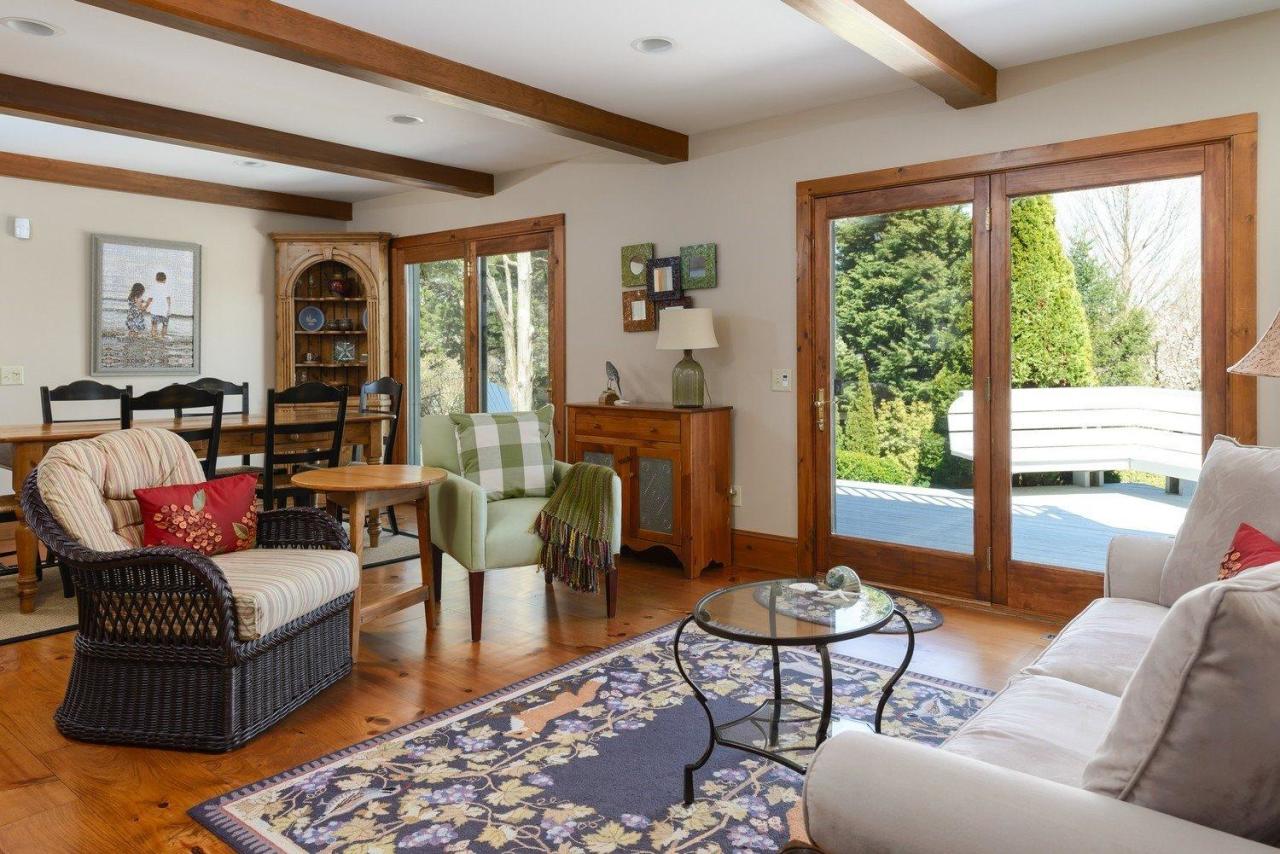 52 Point Hill Road West Barnstable, MA 02668 - Photo 13 of 28 a living room with furniture and a large window