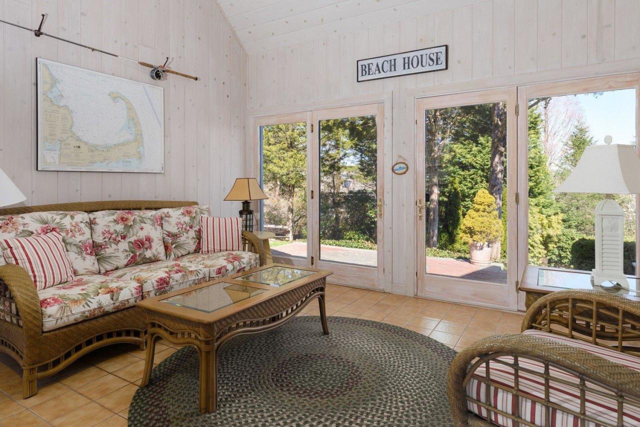 52 Point Hill Road West Barnstable, MA 02668 - Photo 15 of 28 a living room with furniture and a large window