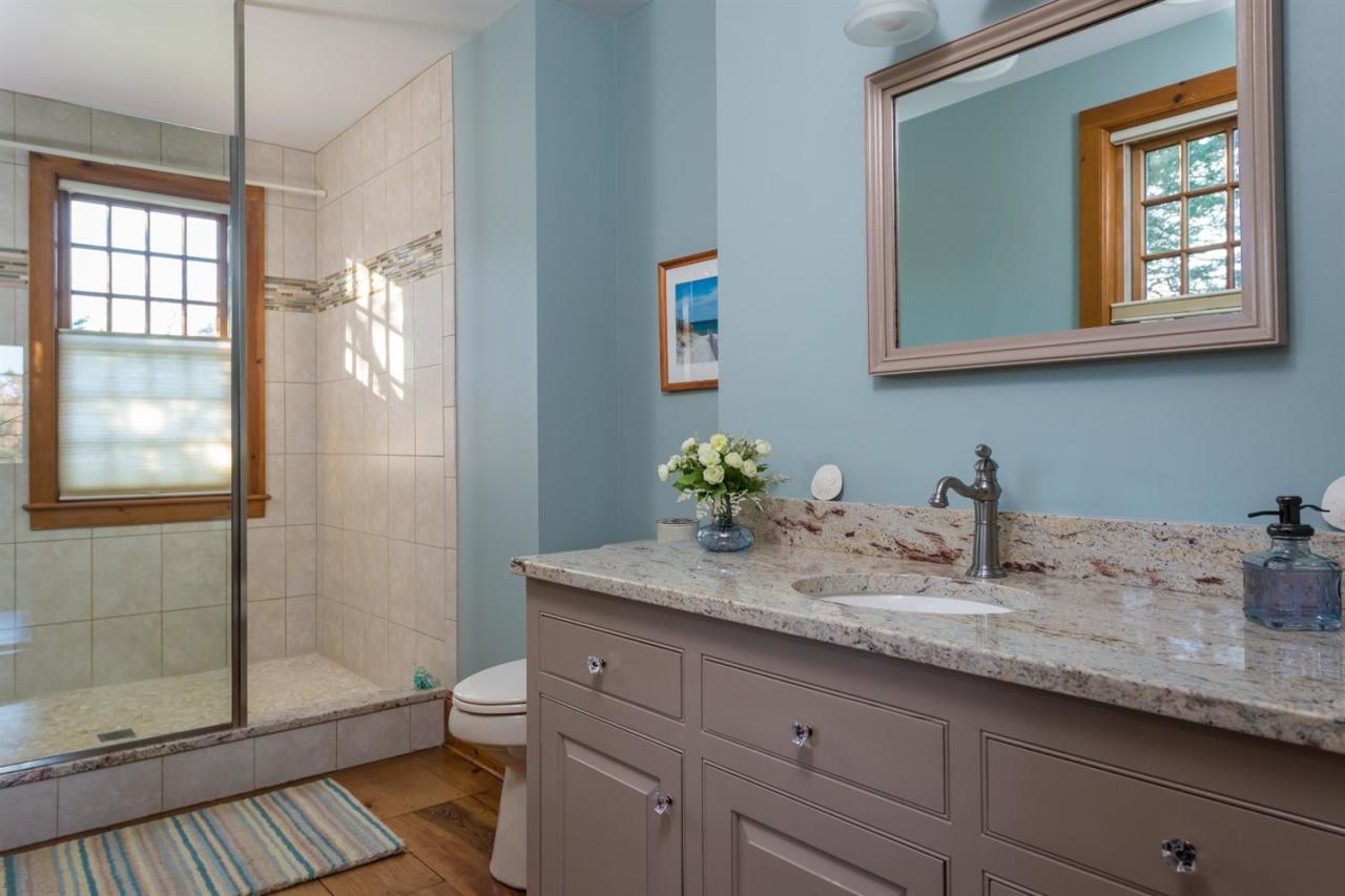 52 Point Hill Road West Barnstable, MA 02668 - Photo 17 of 28 a bathroom with a granite countertop sink toilet and shower