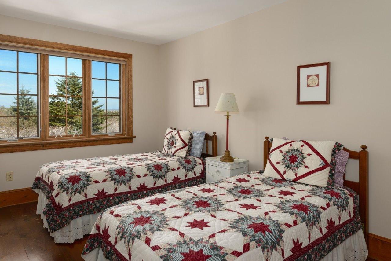 52 Point Hill Road West Barnstable, MA 02668 - Photo 24 of 28 a bedroom with two beds and a window