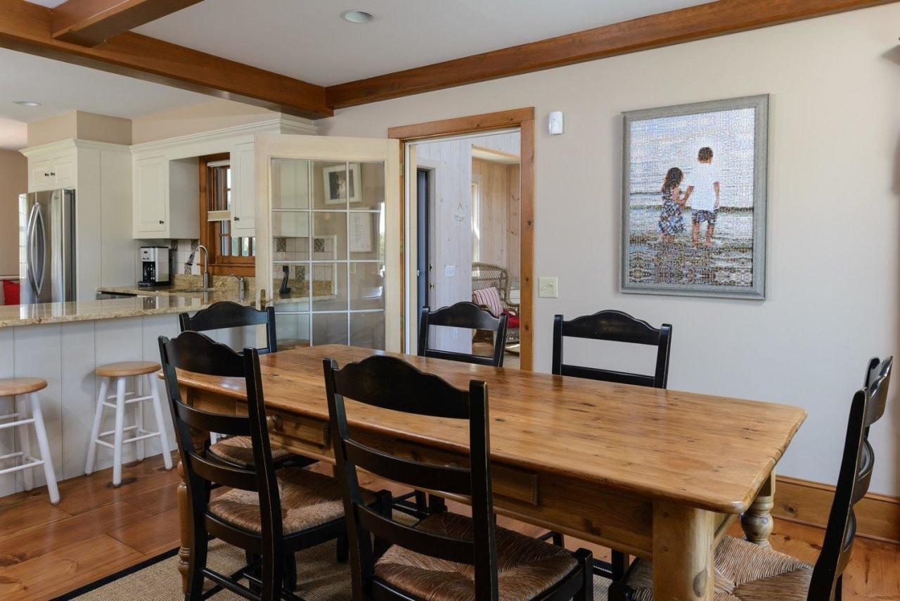 52 Point Hill Road West Barnstable, MA 02668 - Photo 10 of 28 a view of a dining room with furniture