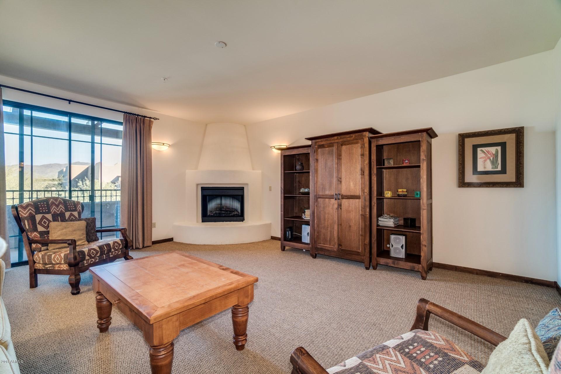 36601 North Mule Train Road, Unit 36D Carefree, AZ 85377 - Photo 10 of 22 Cozy Fireplace