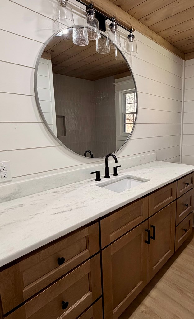1819 Boardtown Road Ellijay, GA 30540 - Photo 11 of 13 a bathroom with a sink and mirror