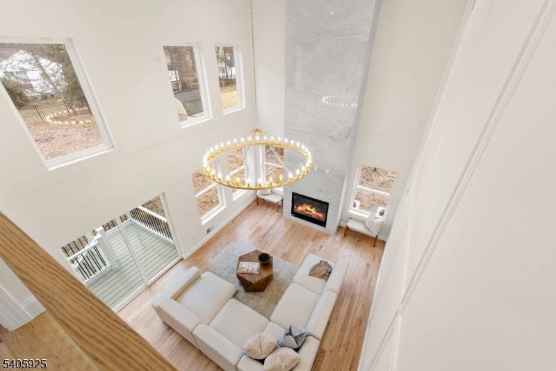 100 Louis Street Whippany, NJ 07981 - Photo 11 of 47 a living room with a couch