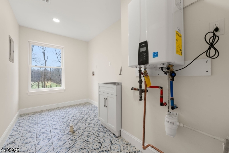 100 Louis Street Whippany, NJ 07981 - Photo 43 of 47 a bathroom with a sink and a mirror