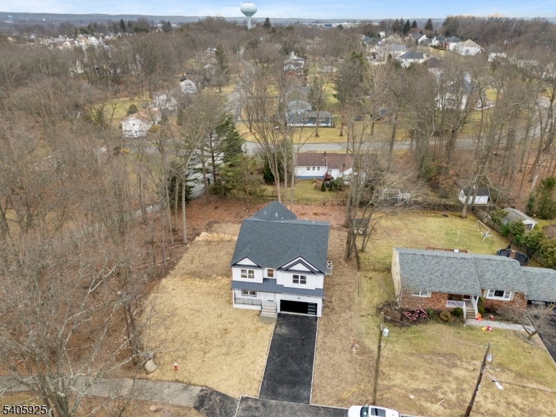 100 Louis Street Whippany, NJ 07981 - Photo 47 of 47 an aerial view of a house with parking space