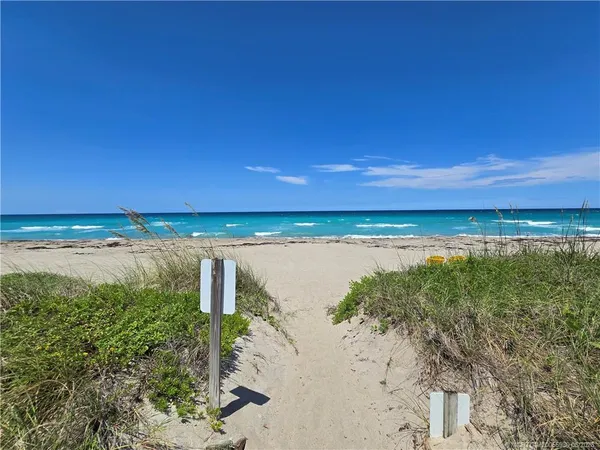 a view of a lake with a beach