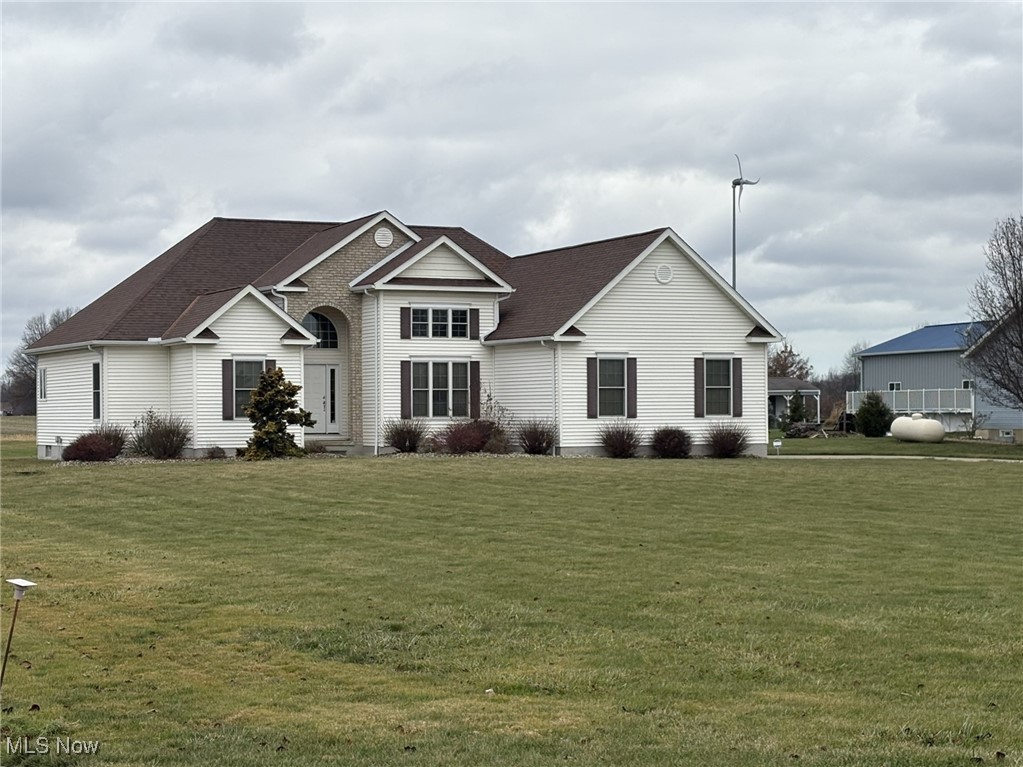 9260 Fowl Road Elyria, OH 44035 - Photo 20 of 25 View of front of home featuring a front lawn