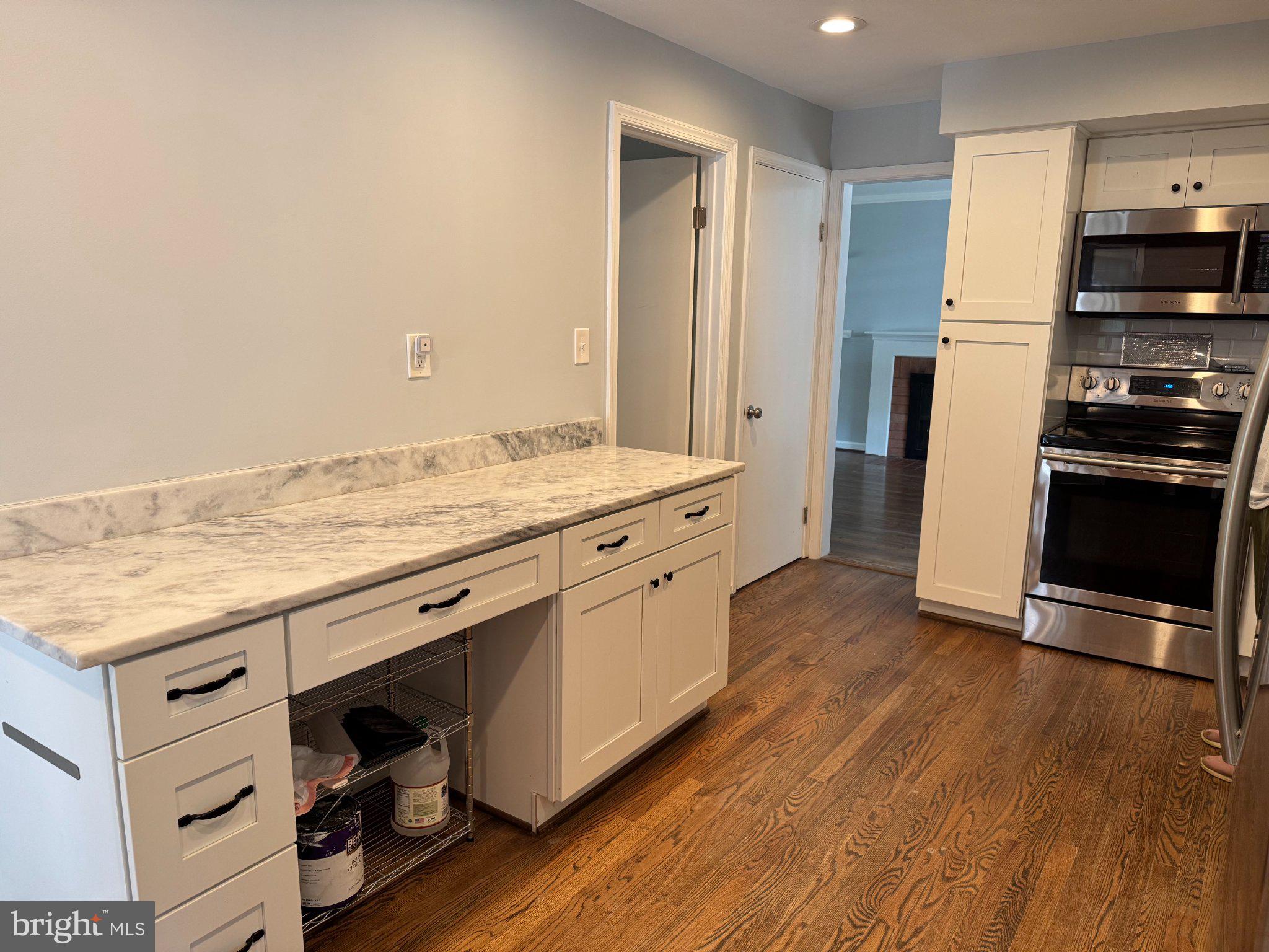 6603 Huntsman Boulevard Springfield, VA 22152 - Photo 12 of 64 Modern kitchen with sleek finishes.
