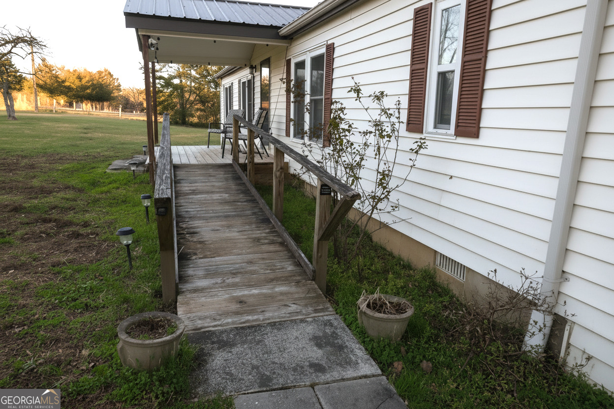 138 Omer Bond Road Royston, GA 30662 - Photo 17 of 17 a view of a pathway of a house with backyard