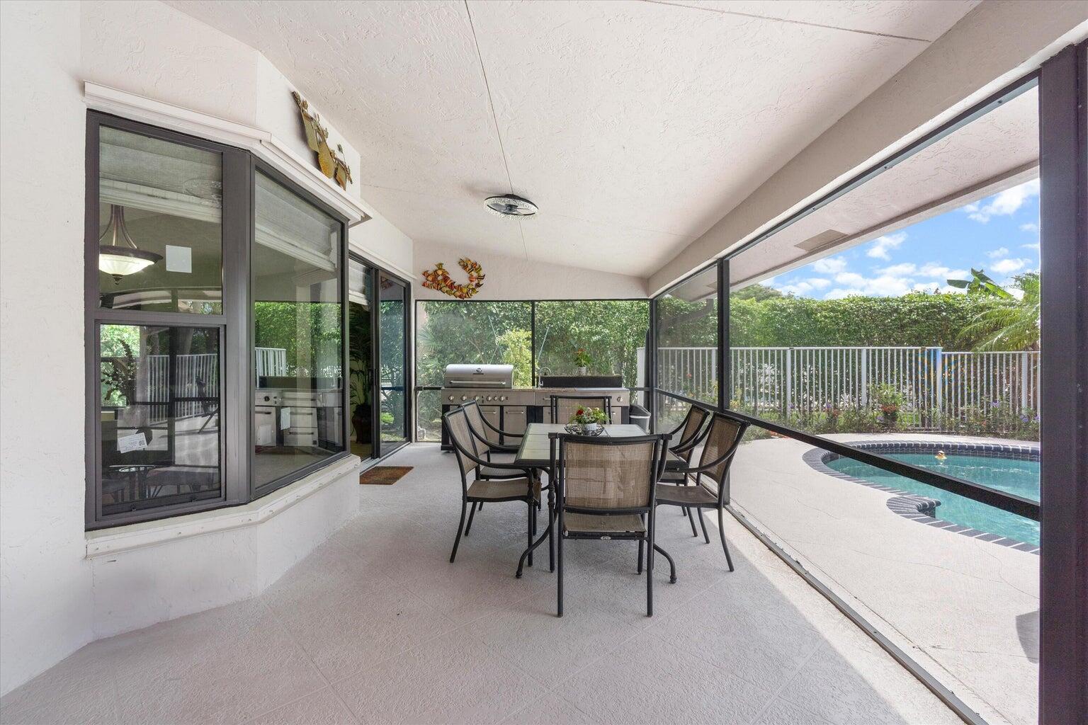 11241 Island Lakes Lane Boca Raton, FL 33498 - Photo 14 of 47 a outdoor space with chairs
