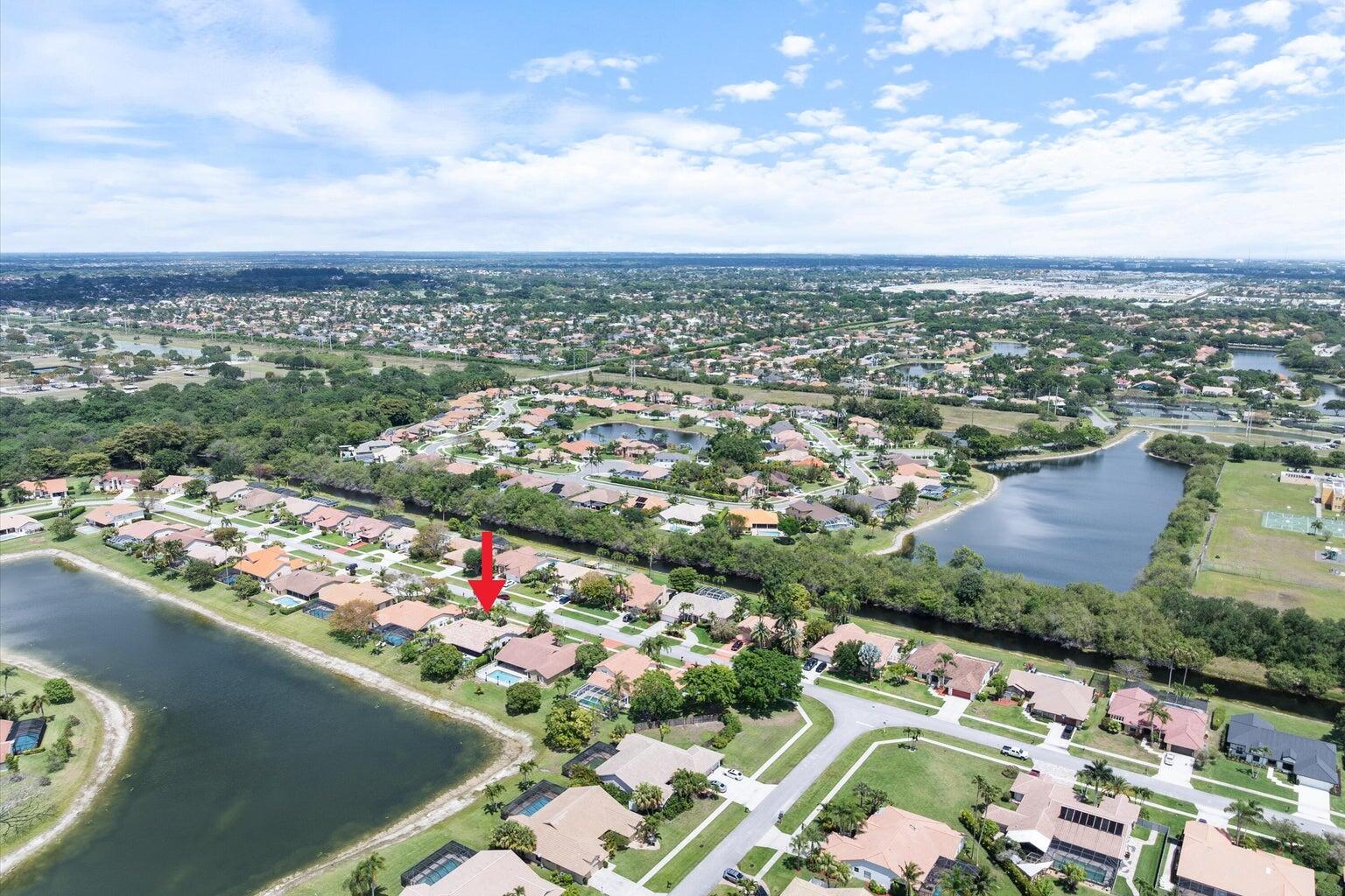 11241 Island Lakes Lane Boca Raton, FL 33498 - Photo 5 of 47 an aerial view of residential houses with outdoor space