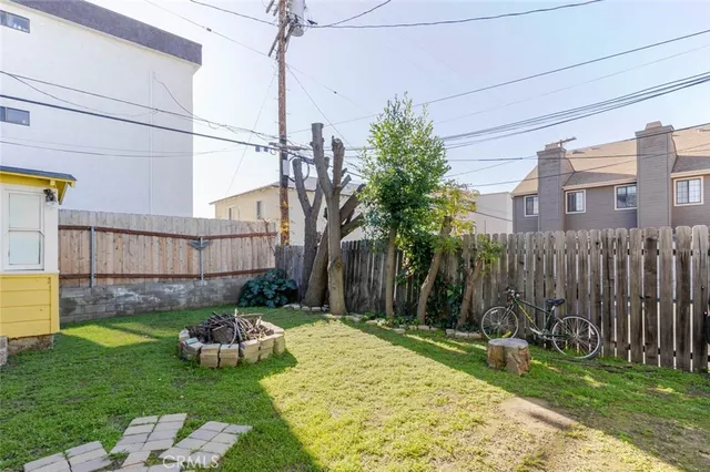 a close up view of a utility room with dryer and washer