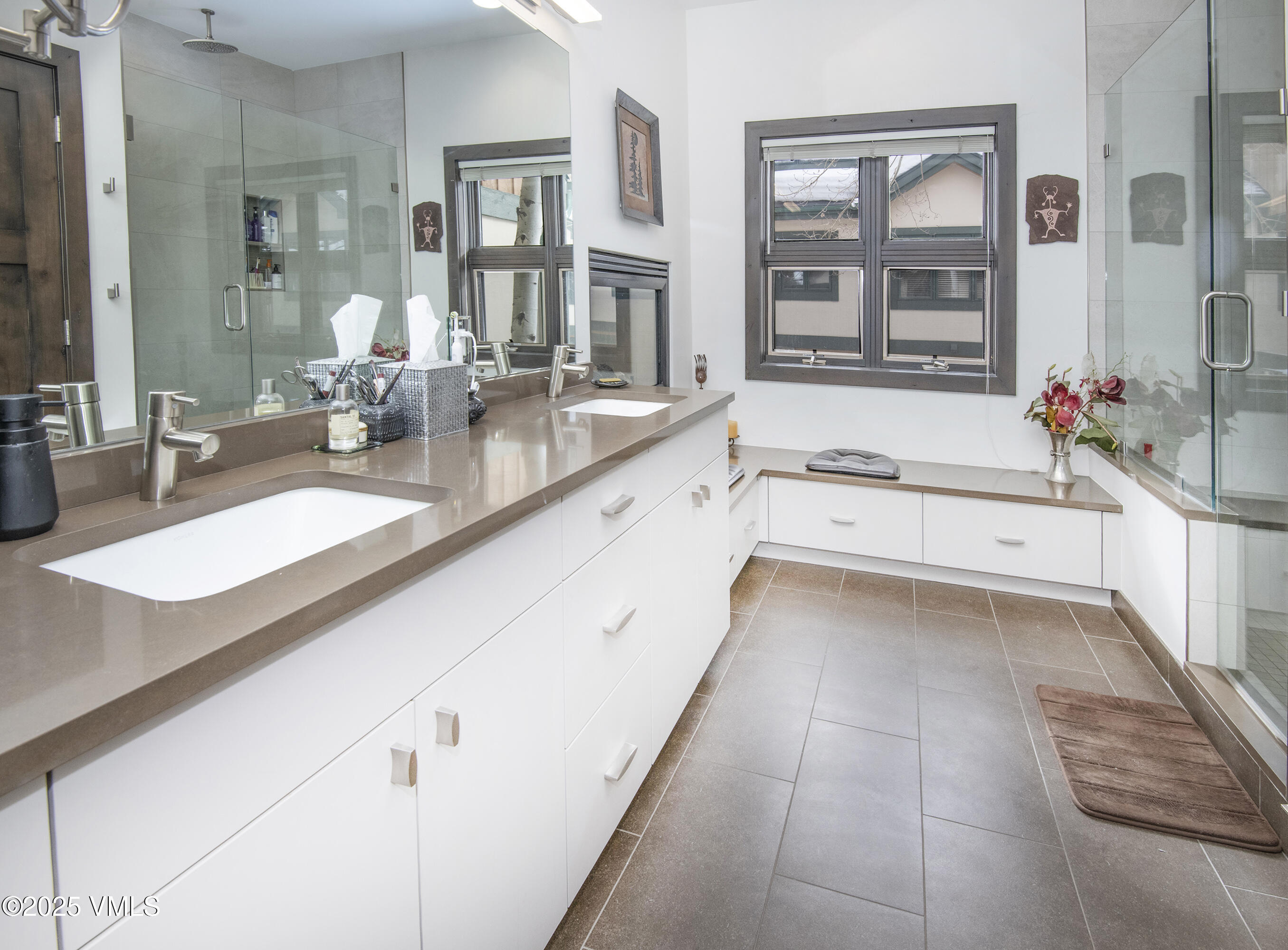 1890 Lions Ridge Loop, Unit 8 Vail, CO 81657 - Photo 16 of 39 a large white kitchen with a sink and cabinets