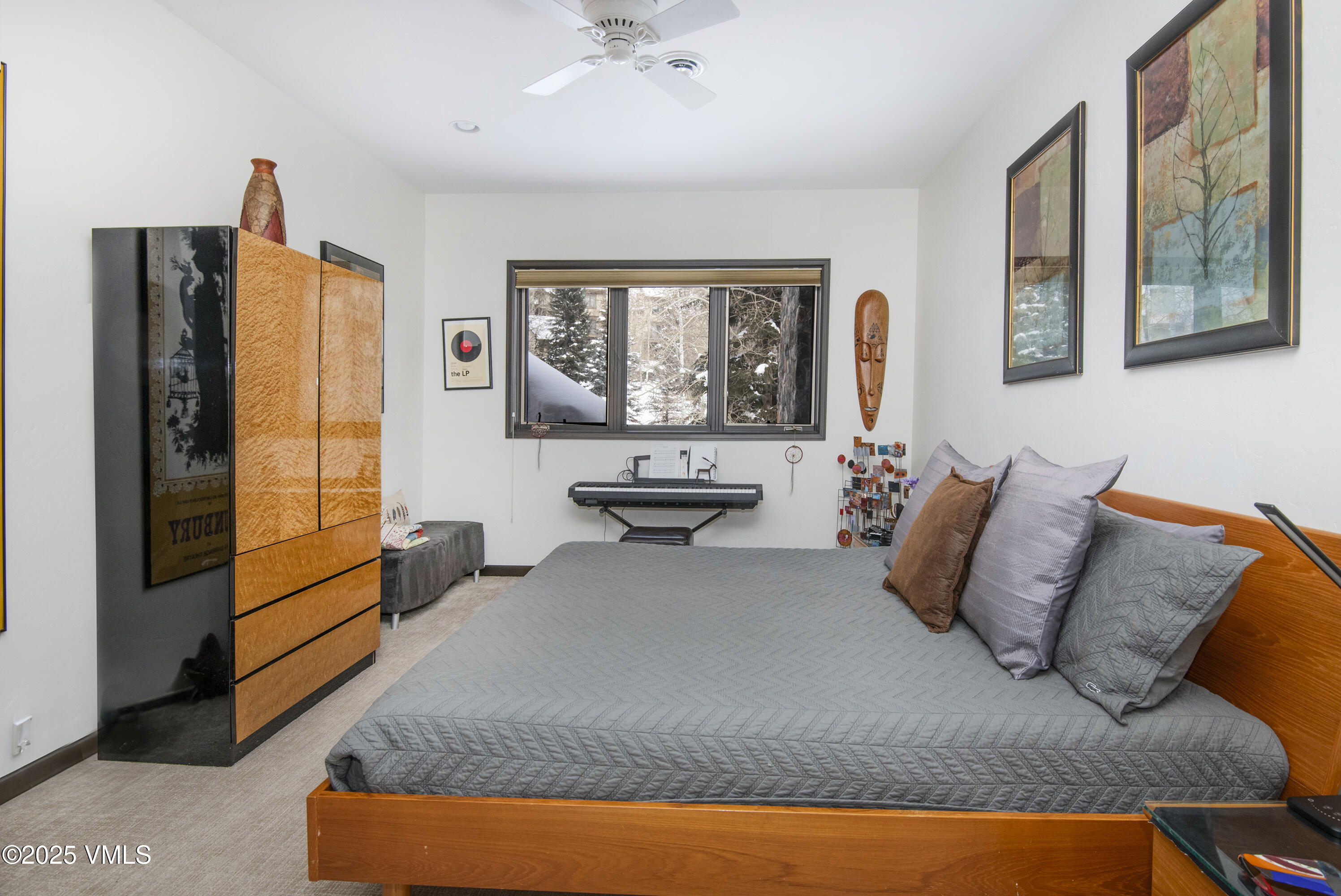 1890 Lions Ridge Loop, Unit 8 Vail, CO 81657 - Photo 21 of 39 a living room with furniture and a large window