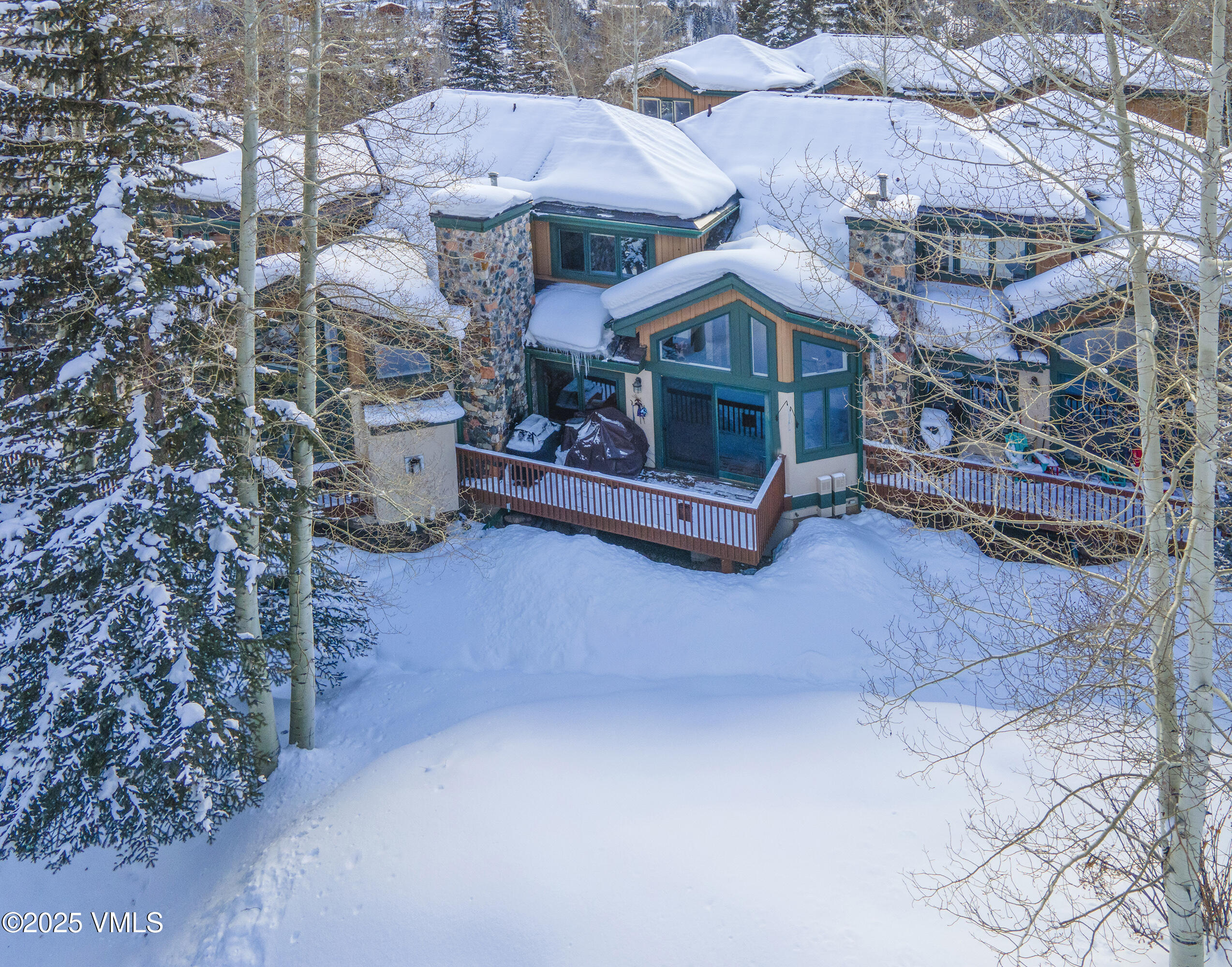 1890 Lions Ridge Loop, Unit 8 Vail, CO 81657 - Photo 35 of 39 a front view of a house with a yard