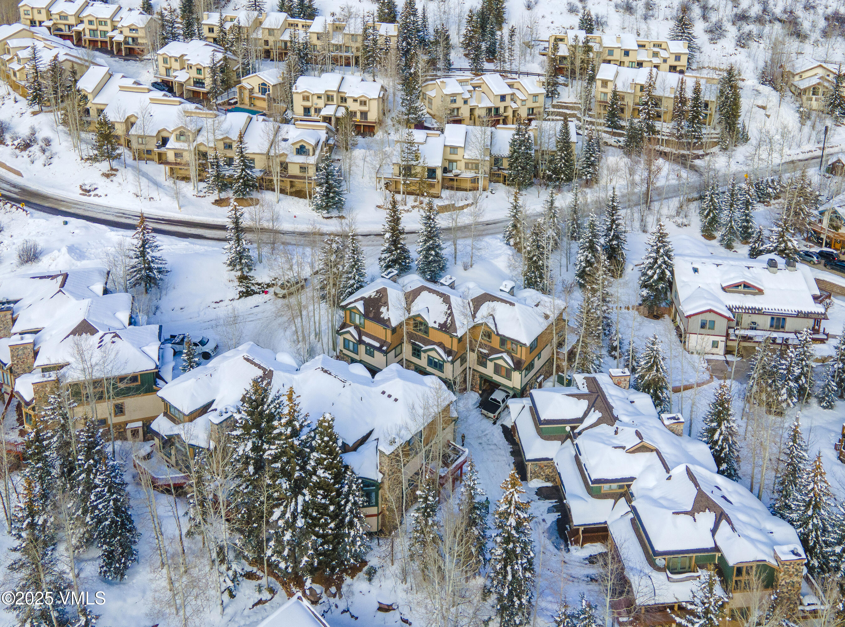 1890 Lions Ridge Loop, Unit 8 Vail, CO 81657 - Photo 38 of 39 an aerial view of a city with lots of residential buildings