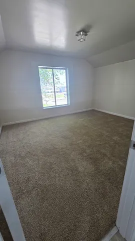 en empty room with windows