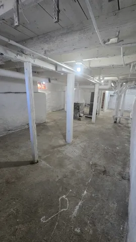 a view of a street with a building in the background