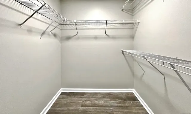 a view of a room with racks on the wall