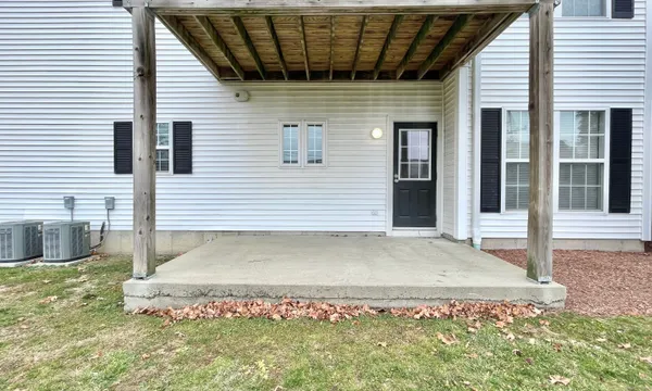 a view of a backyard of the house
