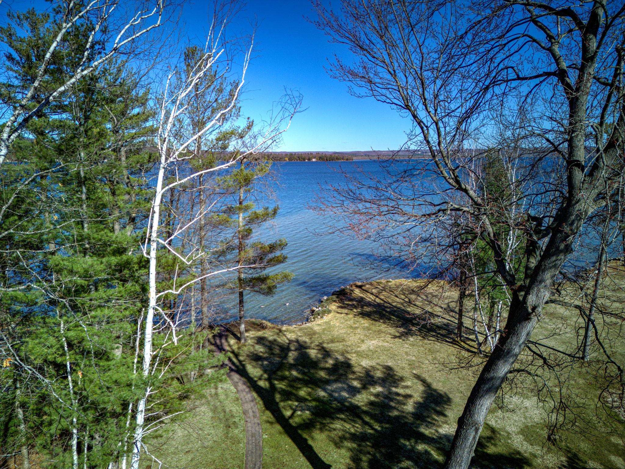 9240 Skegemog Point Road Williamsburg, MI 49690 - Photo 3 of 46 1931993-bc239eb8-e440-4b1e-a7d9-8ac8f7ba0b42.JPG