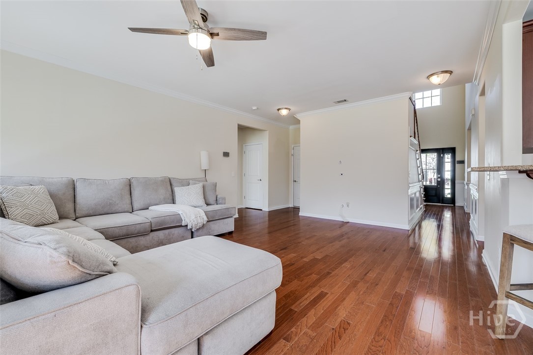 411 Plantation Place Rincon, GA 31326 - Photo 12 of 38 Spacious family room with beautiful views of the backyard