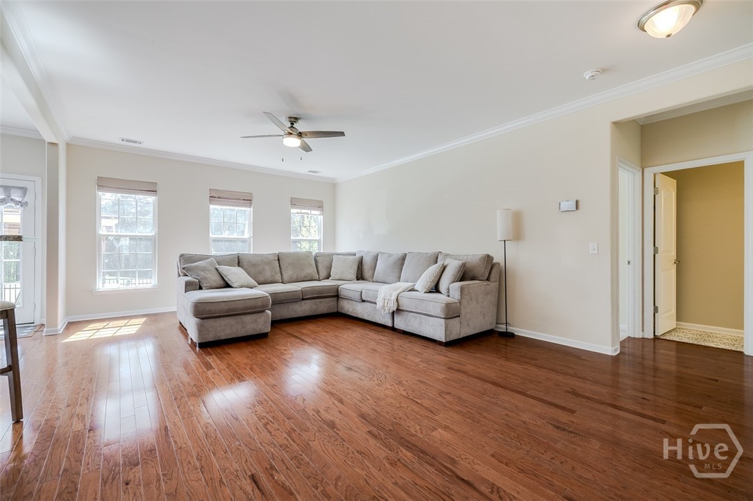 411 Plantation Place Rincon, GA 31326 - Photo 13 of 38 Spacious family room with beautiful views of the backyard