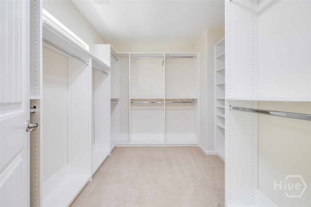 411 Plantation Place Rincon, GA 31326 - Photo 21 of 38 Primary closet with wonderful builtins!