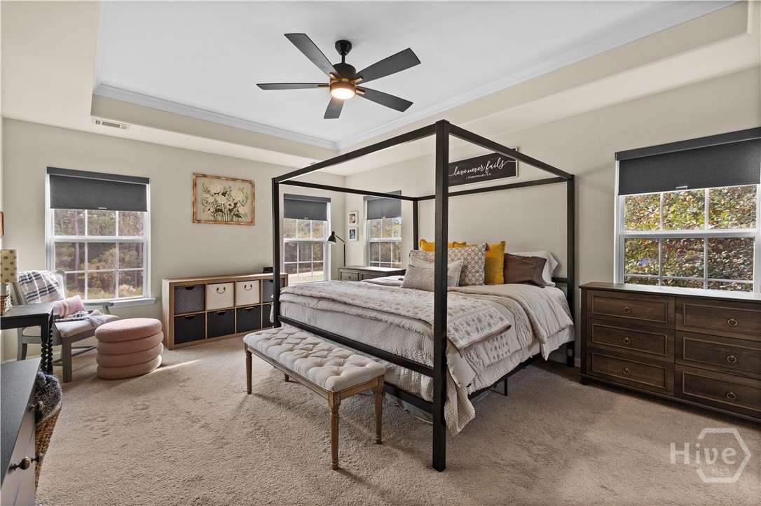 411 Plantation Place Rincon, GA 31326 - Photo 4 of 54 Spacious primary suite with beautiful views.