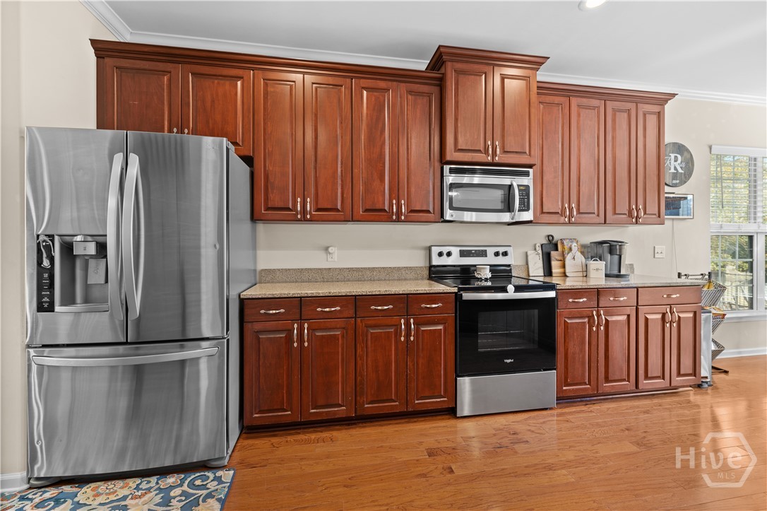411 Plantation Place Rincon, GA 31326 - Photo 6 of 54 Spacious kitchen perfect for entertaining!