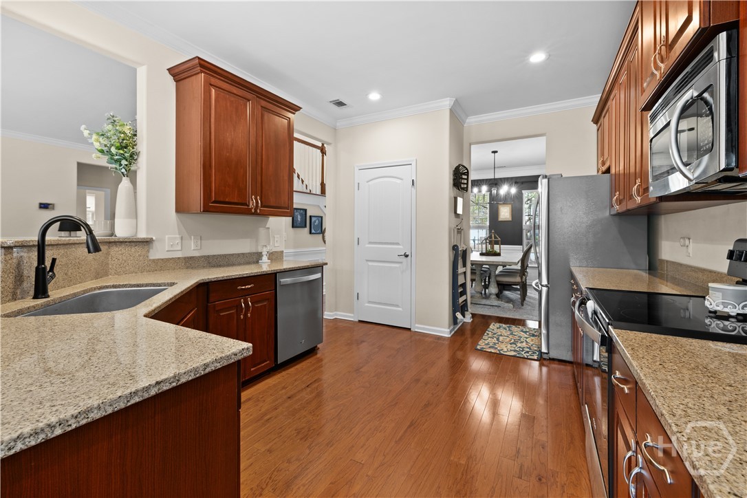 411 Plantation Place Rincon, GA 31326 - Photo 7 of 54 Spacious kitchen perfect for entertaining!