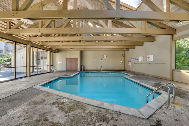 an aerial view of a building with outdoor space