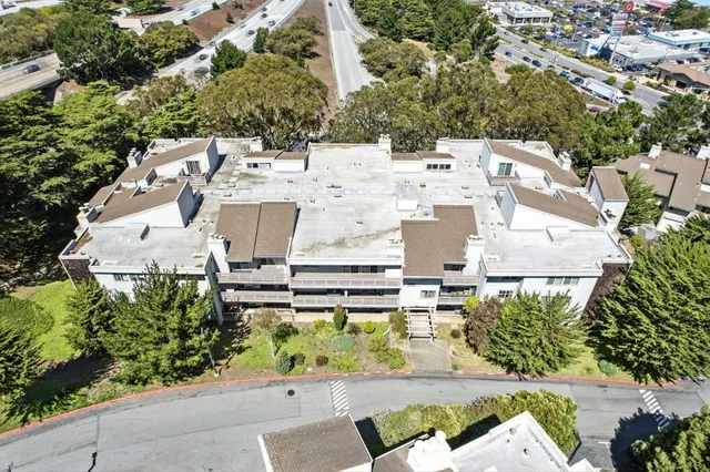 an aerial view of residential house with parking space