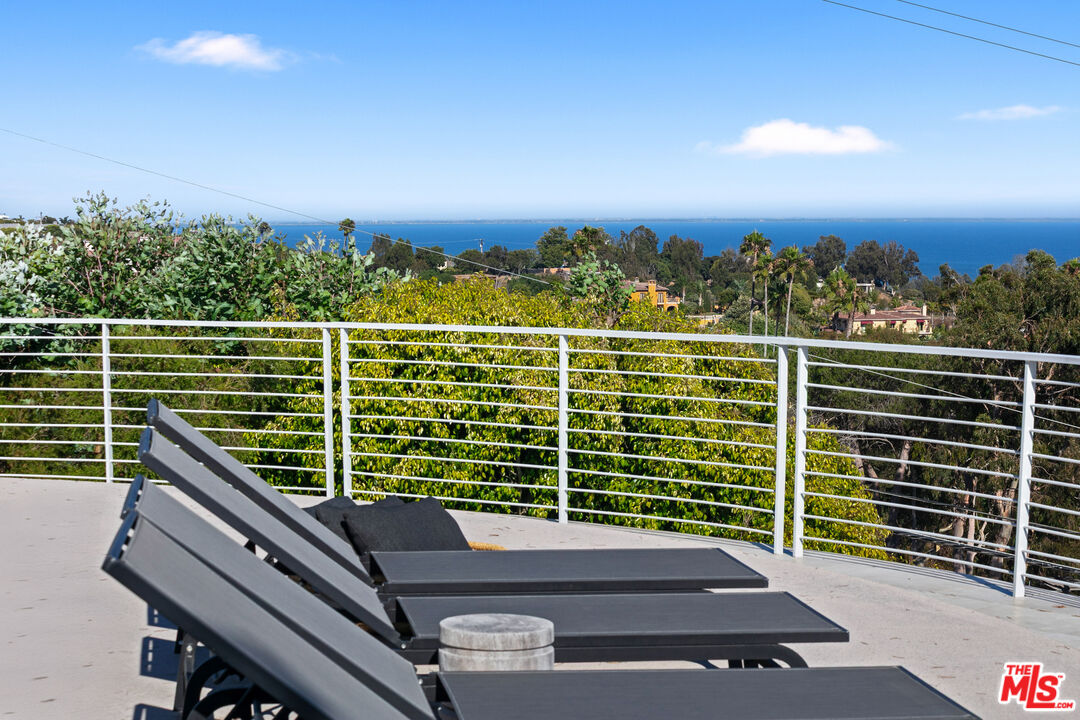 6375 Gayton Place Malibu, CA 90265 - Photo 26 of 49 a view of a balcony with two chairs
