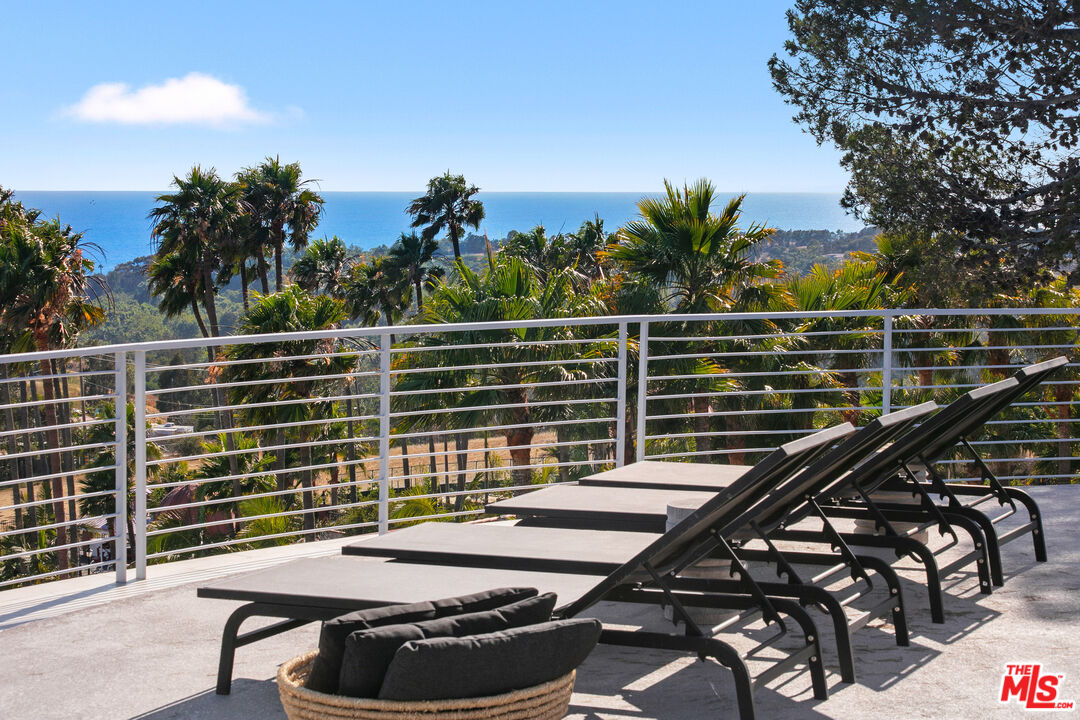 6375 Gayton Place Malibu, CA 90265 - Photo 27 of 49 a view of a balcony with chairs