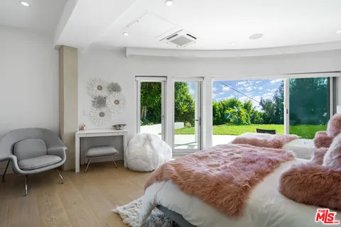 a garden view with a sitting space