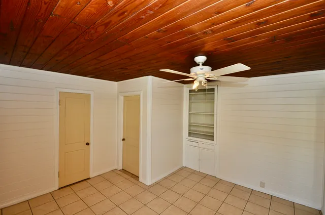 a view of a yard with swimming pool