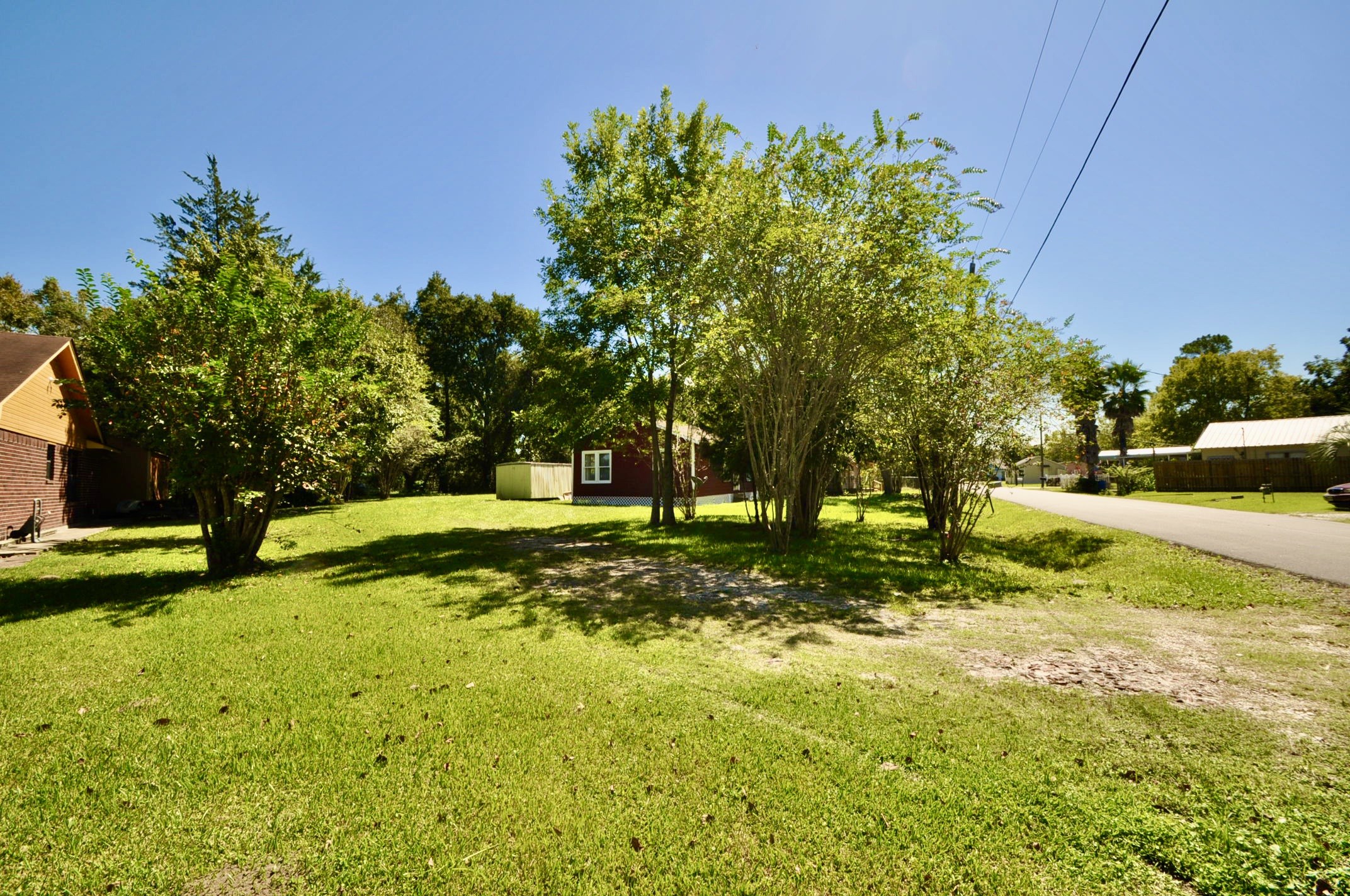 1807 Bell Street Dayton, TX 77535 - Photo 33 of 34 a view of a yard with swimming pool