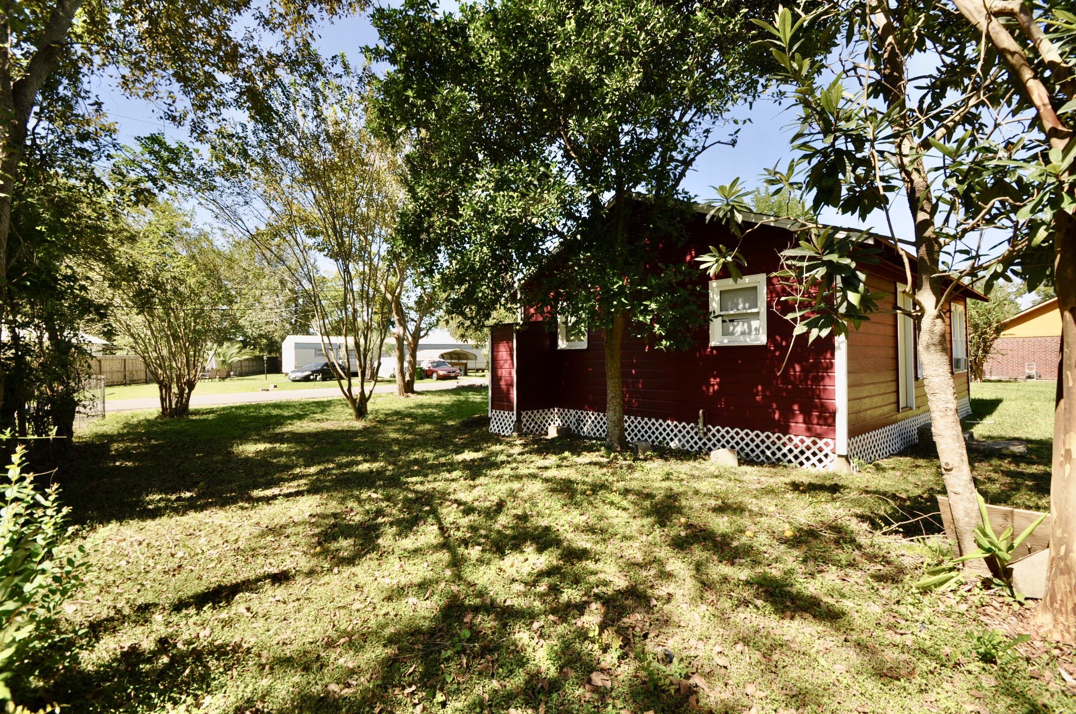 1807 Bell Street Dayton, TX 77535 - Photo 9 of 34 a view of yard with tree