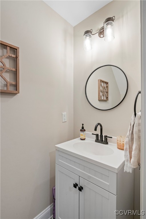 6310 Rock Run Road Chesterfield, VA 23832 - Photo 18 of 38 a bathroom with a sink and a mirror