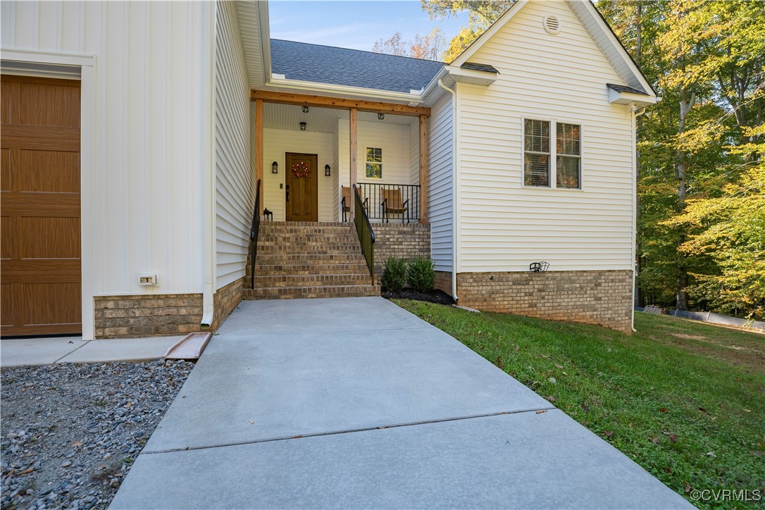 6310 Rock Run Road Chesterfield, VA 23832 - Photo 2 of 38 a front view of a house with a yard