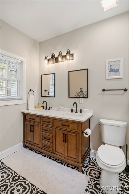 6310 Rock Run Road Chesterfield, VA 23832 - Photo 24 of 38 a spacious bathroom with a double vanity sink mirror and toilet