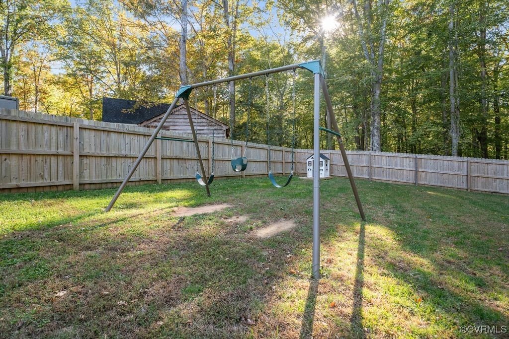 6310 Rock Run Road Chesterfield, VA 23832 - Photo 34 of 38 a backyard of a house and deck